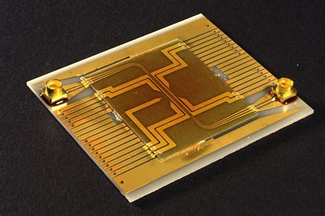 Trapped Atom Clock On A Chip