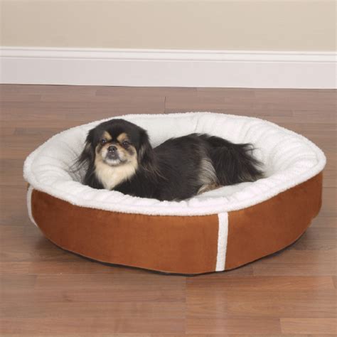 Maybe you would like to learn more about one of these? Sleepy Sherpa Donut Dog Bed | Dog Boutique at Glamourmutt.com