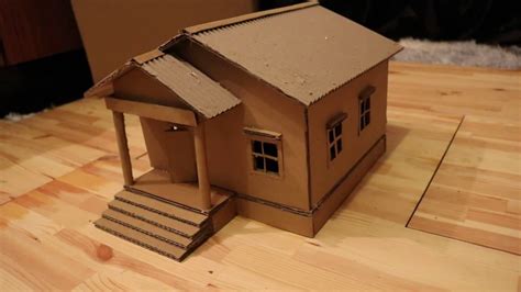 Como construír unha casa de cartón en miniatura Revista de limpeza