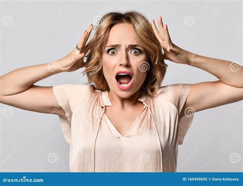 Image Of Excited Screaming Shocked Beautiful Woman Standing Isolated Over Light Background