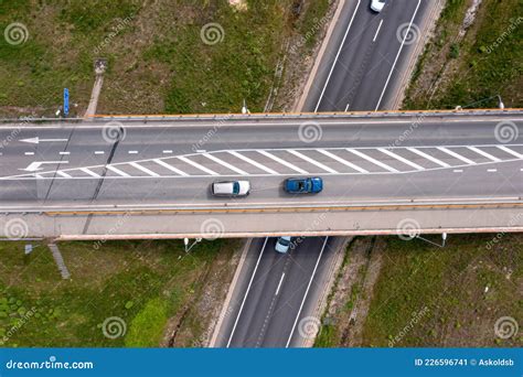 Aerial Top View Of Highway Multilevel Junction Vehicles Drive On Roads