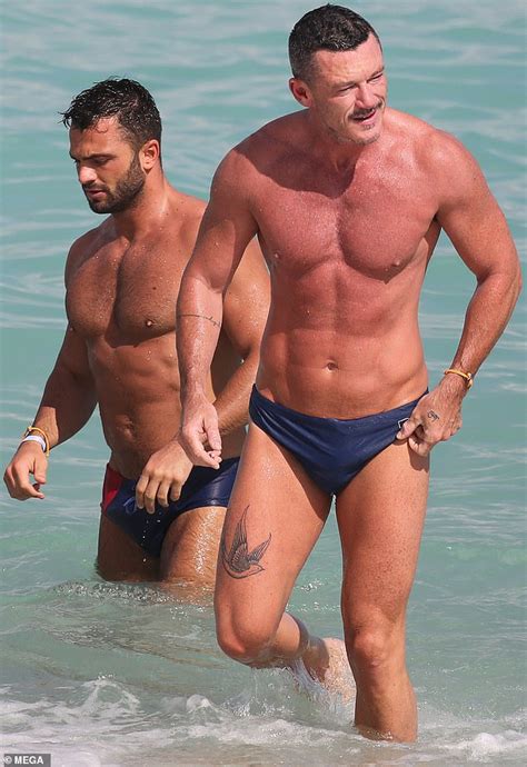 Luke Evans Shows Off His Very Ripped Physique With Mystery Man In Miami