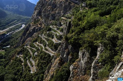 Cyclists Climb The Lacets De Montvernier Between Gap And Saint Jean De