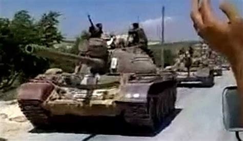 dozens die thousands flee syrian tank assault in hama nz