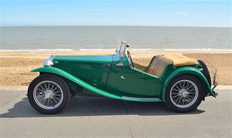 Classic Green Mg Sports Car Parked On Seafront Promenade Stock Photo