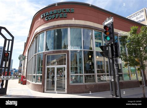 Starbucks Coffee Shop On Corner Of Street In Downtown Winnipeg Manitoba