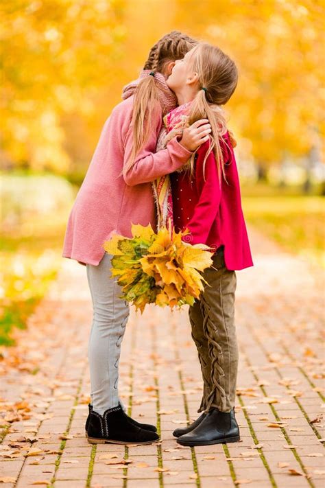 Little Adorable Girls At Warm Day In Autumn Park Outdoors Stock Image Image Of Lifestyles