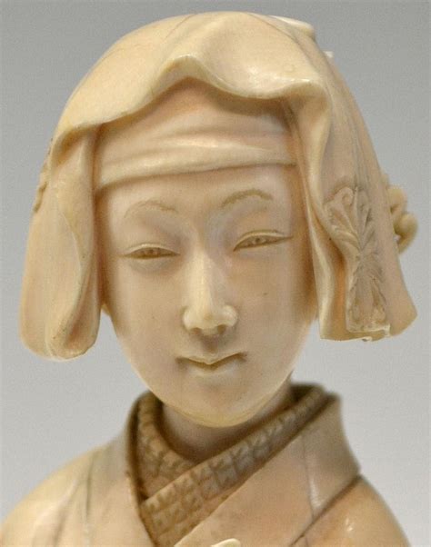 Japanese Carved Ivory Figure Of A Geisha