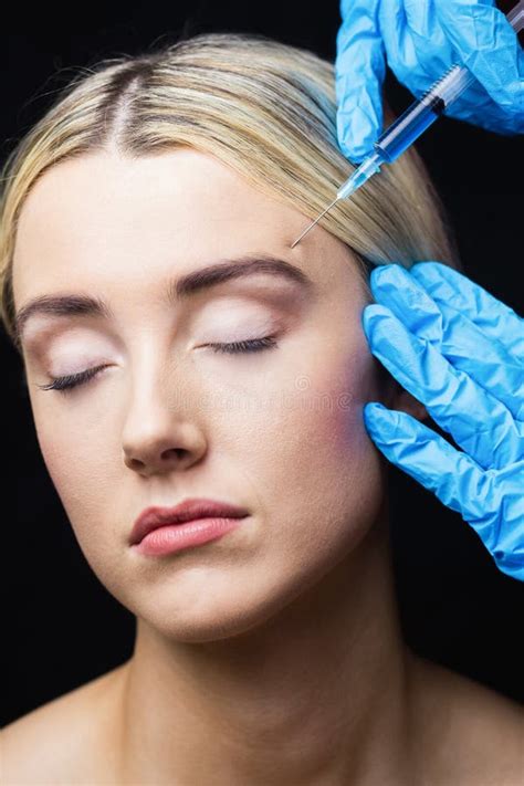 Woman Receiving Botox Injection On Her Forehead Stock Image Image Of