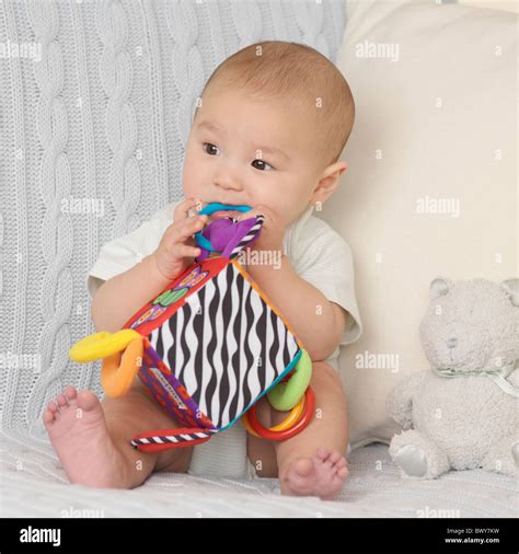 Baby Playing With Toy Stock Photo Alamy