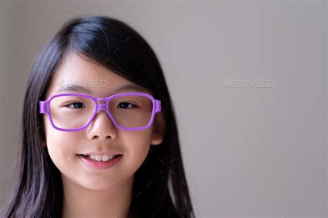 Portrait Of Asian Teenager With Big Purple Glasses Stock Photo By