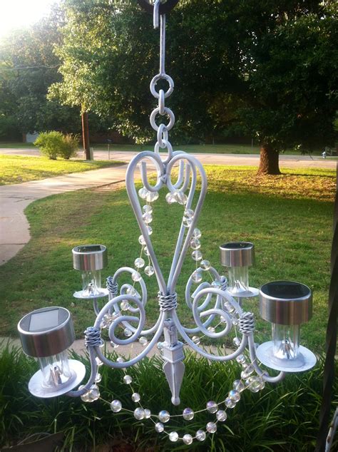 Spray paint a doily onto a light bulb or use a silver pen and draw your own designs. Backyard Elegance With an Outdoor Chandelier - On the Go ...