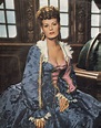 Maureen O'Hara wearing a costume designed by Earl Luick for the film ...