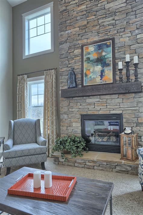 See more ideas about fireplace wall, tiled fireplace wall, fireplace. Beautiful 2-story stone surround fireplace. #ownalandmark #projectdreamhouse | Home fireplace ...