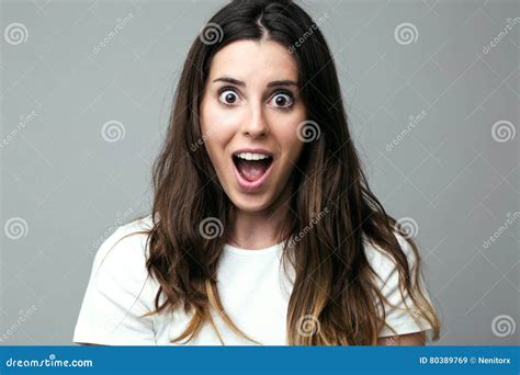 Surprised Young Woman Looking At Camera Stock Image Image Of