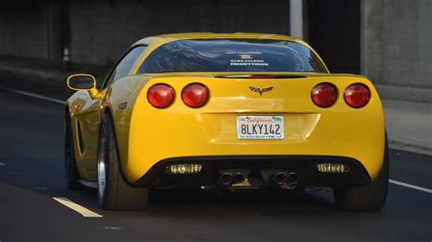 Download Wallpaper 2048x1152 Chevrolet Corvette Chevrolet Car Yellow