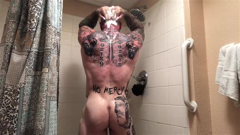 Beefy Tattooed Muscle Bodybuilder Takes A Shower And Cum