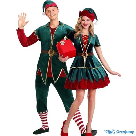 A Man And Woman Dressed In Christmas Costumes