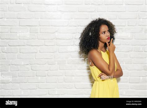 Portrait Of Puzzled Woman Having Doubts Doubtful Black Girl Thinking