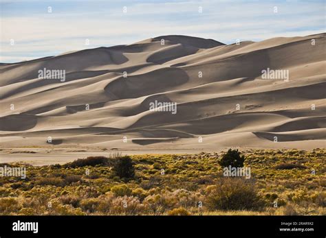 The Great Sand Dunes National Park Dune Field At Sunset In Colorado