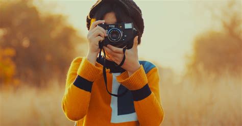 Person Taking Photo Using Camera · Free Stock Photo