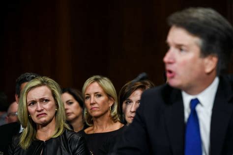 Poignant Photo Of Women Crying Scowling Behind Kavanaugh Goes Viral