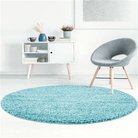 Die einzigartige, griffige wollstruktur und die naturbelassenen farben machen sie zu. Runde Teppiche - Trim (Türkis) - Trendcarpet.at