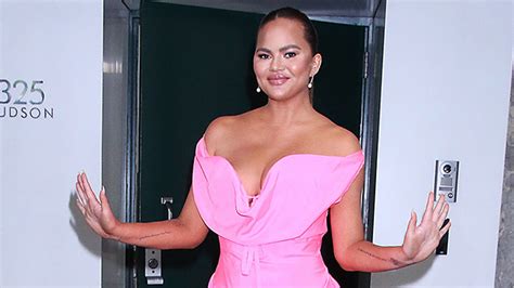 Chrissy Teigen Claps Back After Hater Says Her New Face Is Due To Overfill I Gained Weight