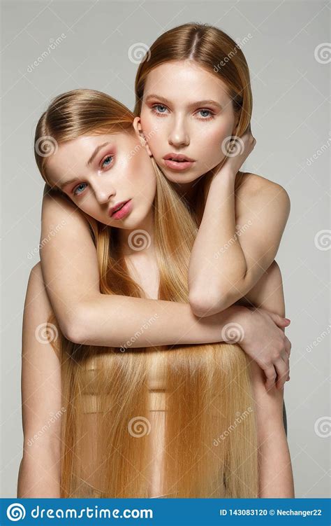 Fashion Lifestyle Portrait Of Two Pretty Friends Girls With Amazing