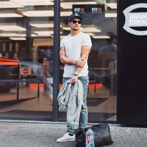 Casual Summer Inspiration With A Baseball Cap White T Shirt Light Wash