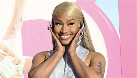 Fans Cut Up Over Nicki Minaj Chopping Her Barbie Premiere Wig