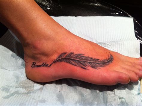 Https://tommynaija.com/tattoo/feather Foot Tattoo Designs