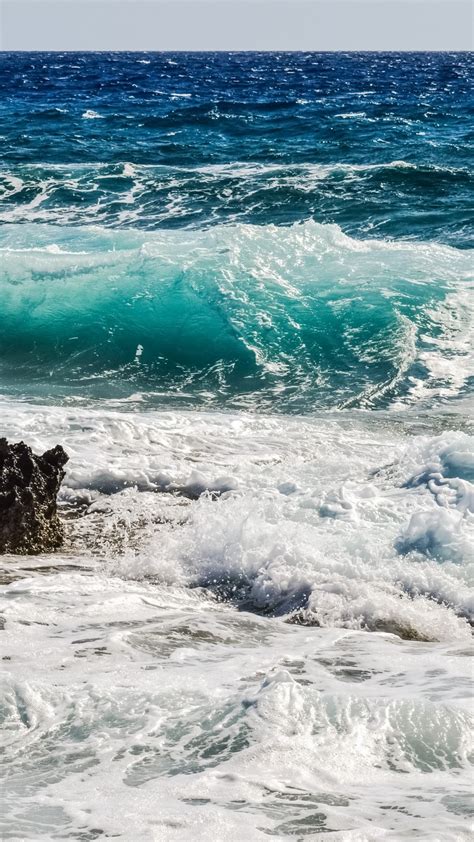 Download 1080x1920 Ocean Waves Rock Horizon Foam Sea