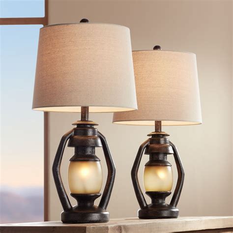 A floor lamp in the living room can provide the perfect amount of ambient lighting in a space where you may prefer a soft amount of illumination to complement focal pieces present in the area like a chandelier or pendant. Franklin Iron Works Rustic Table Lamps Set of 2 with Nightlight Miner Lantern Brown Oatmeal Drum ...