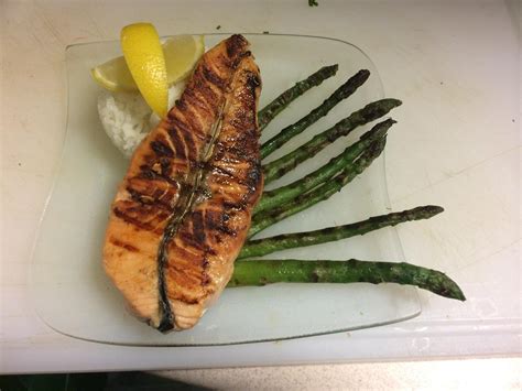 Broil the fish for three to five minutes on each side. Homemade Salmon Stake marinated in wasabi soy sauce with grilled asparagus and jasmin rice. : food