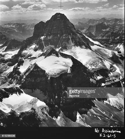 British Columbias Mount Assiniboine A Triangular Peak On The Border