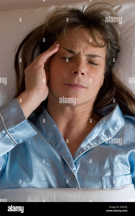 Woman With Headache Stock Photo Alamy