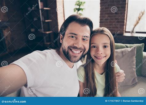 Closeup Photo Of Little Funny Lady Her Handsome Young Daddy Friendship Sit Comfy Sofa Making