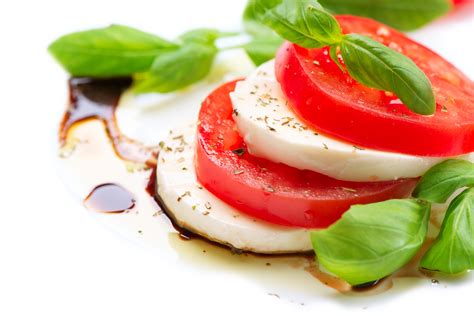 Caprese Salad Tomato And Mozzarella Slices With Basil Leaves O Foodtown
