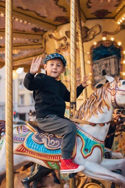 Baby Boy In A Carousel Stock Photo By ©igabriela 82631730