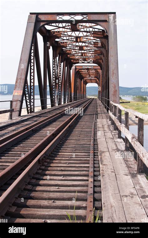 Iron And Wooden Railroad Trestle Bridge In Quebec Canada Stock Photo