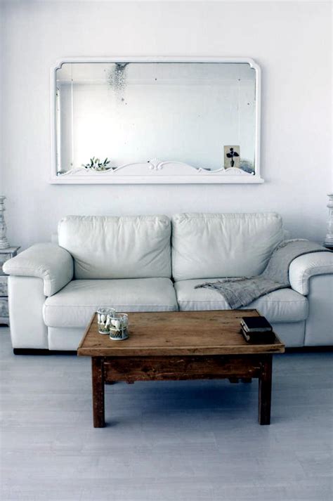 White interiors are perhaps one of the most versatile color schemes for any space in a home. White leather sofa | Interior Design Ideas - Ofdesign