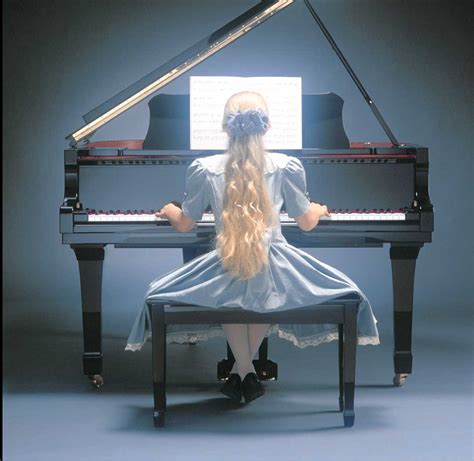 Girl At Piano In Blue Dress England Piano England Piano