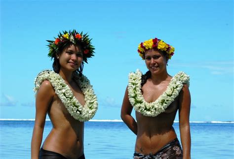 Polynesian Girl Greeted A Tourists On The Paradise Island Of Tahiti