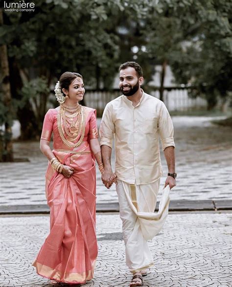 South Indian Couple In Pink Saree In Panche Frugal2fab South Indian