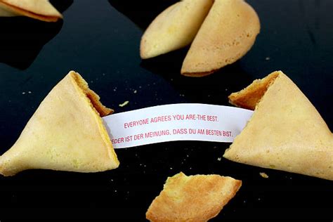 Opening Fortune Cookie Stock Photos Pictures And Royalty Free Images