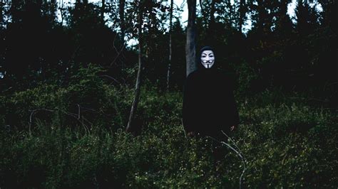 Download Wallpaper 3840x2160 Mask Man Forest Anonymous 4k Uhd 169