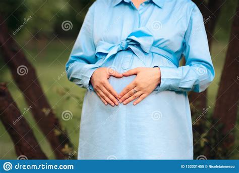 Close Up Of A Pregnant Belly In Maternity Concept Photography Stock
