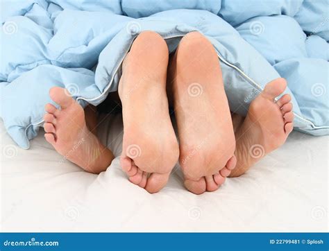 View Of Feet Of Couple Having Sex In Bed Stock Image Image 22799481