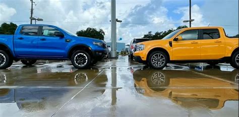 Cyber Orange 2022 Ford Maverick Meets Blue Ranger Stx For Rainy Day